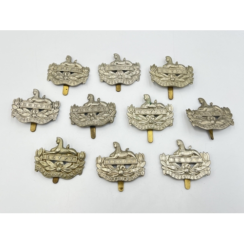 2217 - Ten military cap badges