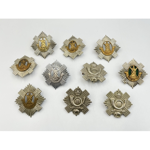 2220 - Ten military cap badges