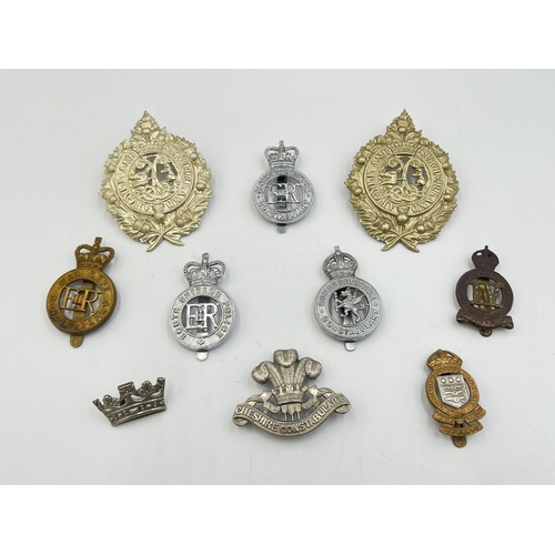 2221 - Ten military cap badges