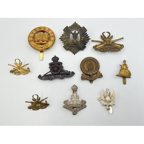 2234 - Ten military cap badges