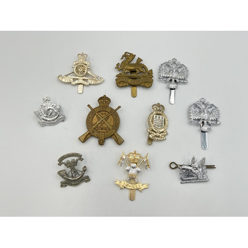 2237 - Ten military cap badges