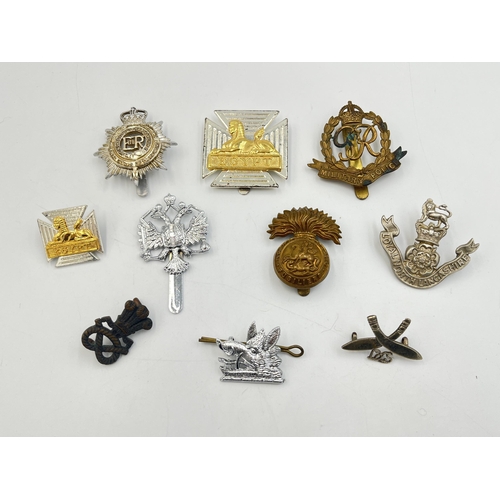 2241 - Ten military cap badges