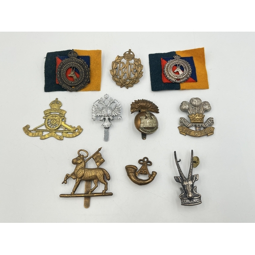 2243 - Ten military cap badges