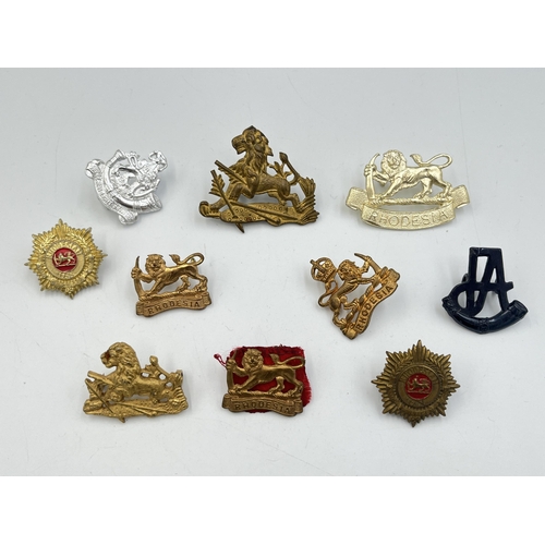 2244 - Ten military cap badges