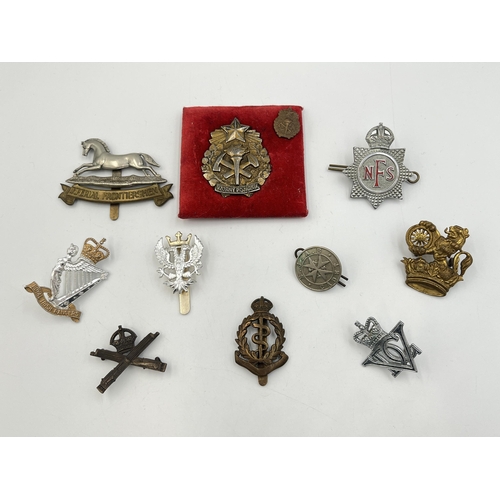 2245 - Ten military cap badges