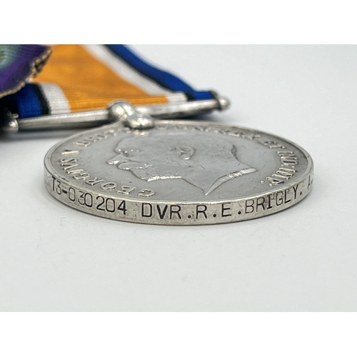 2265 - Two WWI British medals, one War presented to T3-030204 Dvr. R.E. Brigly A.S.C. and one Victory prese... 