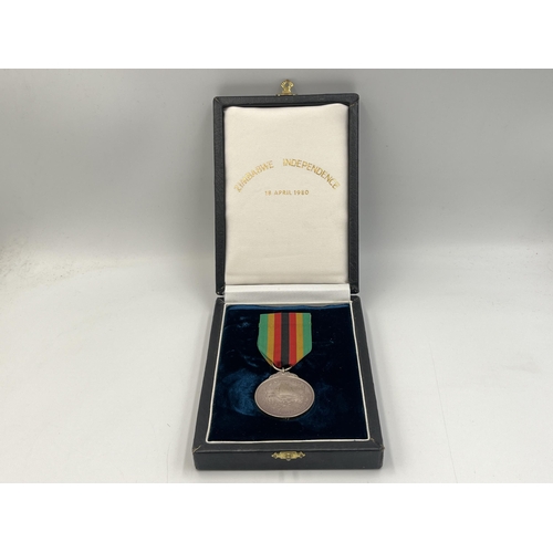 2266 - A boxed Zimbabwe Independence 1980 silver medal