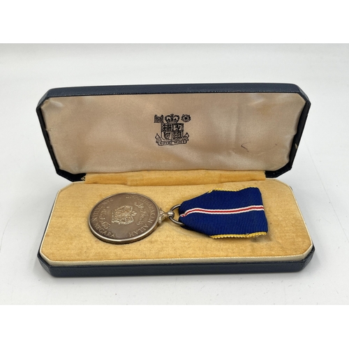 2273 - A boxed Malaysian Order Of The Defender Of The Realm silver medal