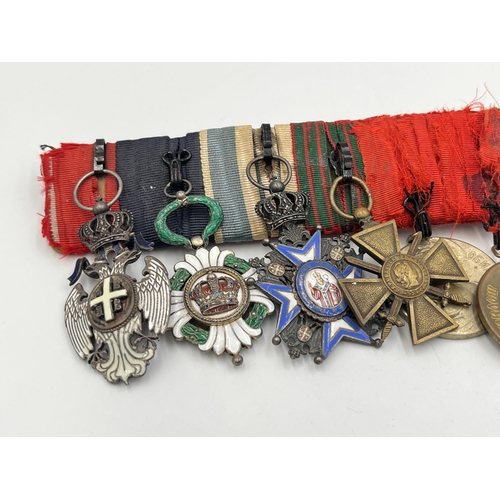 2274 - A WWI and later twelve medal group to include Serbian Order Of The White Eagle, French Croix De Guer... 