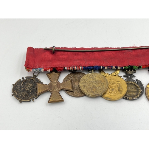 2274 - A WWI and later twelve medal group to include Serbian Order Of The White Eagle, French Croix De Guer... 