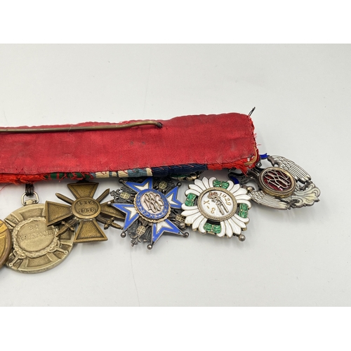 2274 - A WWI and later twelve medal group to include Serbian Order Of The White Eagle, French Croix De Guer... 