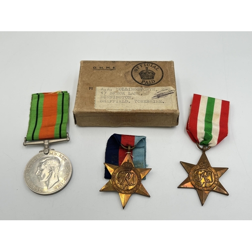 2282 - A boxed WWII medal trio, The Italy Star, Defence and The 1939-1945 Star