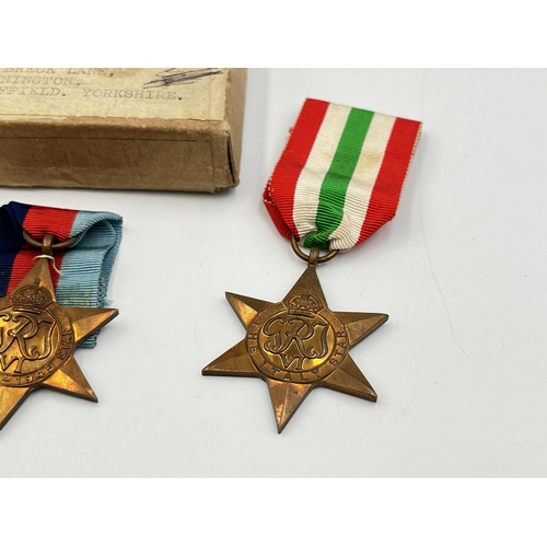 2282 - A boxed WWII medal trio, The Italy Star, Defence and The 1939-1945 Star