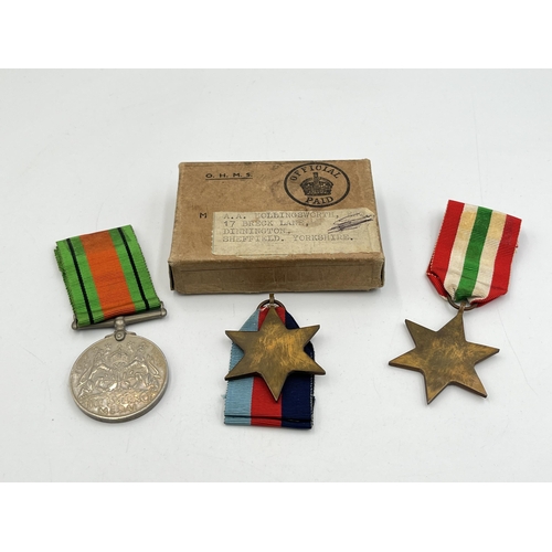 2282 - A boxed WWII medal trio, The Italy Star, Defence and The 1939-1945 Star