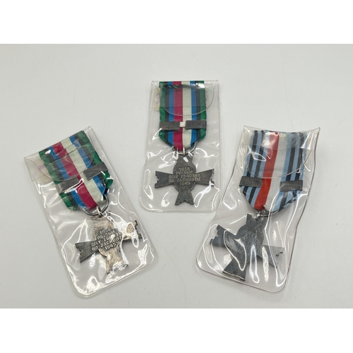 2305 - Three WWII 1939-1945 Polish Military Cross Of Combat medals to include Tobruk, Lagarde etc.