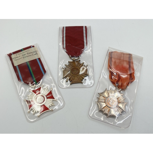 2307 - Three Polish medals, one P.R.L. Cross of Merit, one Cross of Merit for Bravery and one Order of the ... 