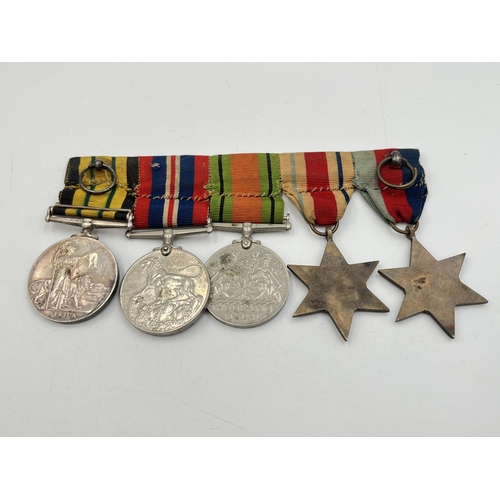 2309 - A WWII British medal group comprising The 1939-1945 Star, The Africa star, Defence, Victory and Afri... 