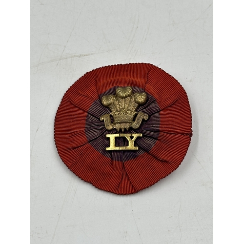 2133 - An Anglo Boer War Imperial Yeomanry slouch hat badge