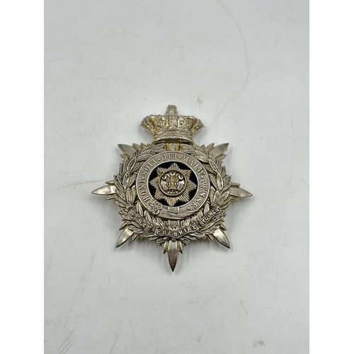 2138 - A Victorian Cheshire Regiment helmet plate