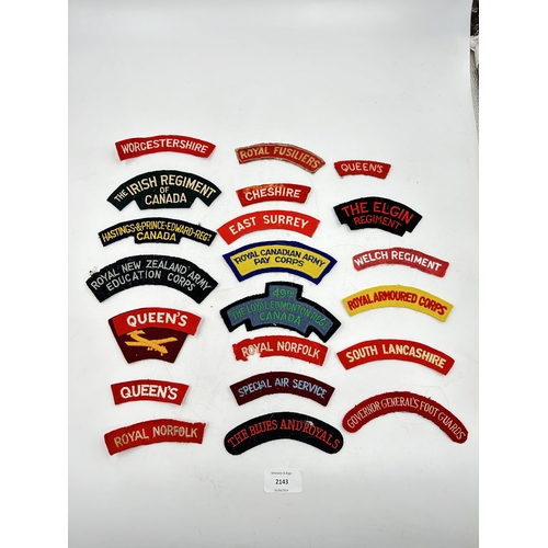 2143 - Twenty two military cloth shoulder patches to include Cheshire, The Irish Regiment of Canada, Royal ... 