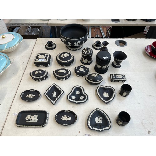 380 - Twenty three pieces of Wedgwood black Jasperware to include circular pedestal bowl, tobacco jar, can... 