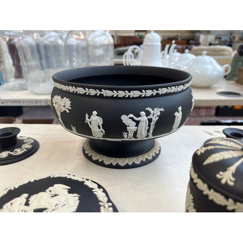 380 - Twenty three pieces of Wedgwood black Jasperware to include circular pedestal bowl, tobacco jar, can... 