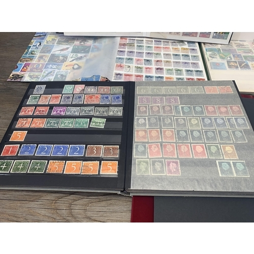 511 - Six albums containing a collection of worldwide stamps