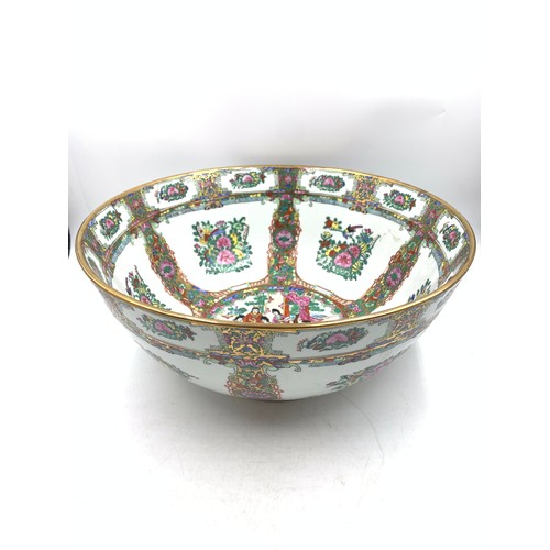 350 - A Chinese Famille Rose hand-painted porcelain circular footed bowl - approx. 35cm diameter