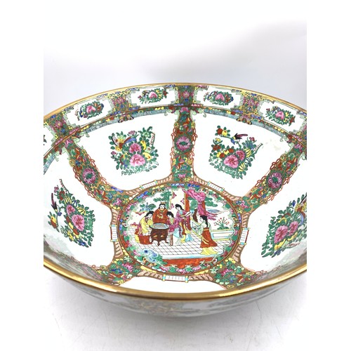 350 - A Chinese Famille Rose hand-painted porcelain circular footed bowl - approx. 35cm diameter