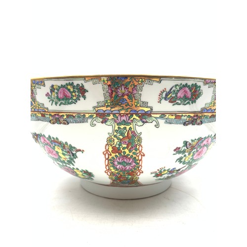 350 - A Chinese Famille Rose hand-painted porcelain circular footed bowl - approx. 35cm diameter