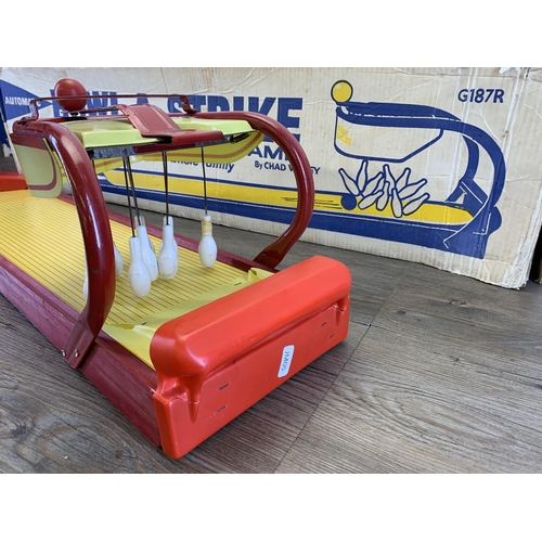 431 - A vintage boxed Chad Valley Bowl-A-Strike automatic bowling game