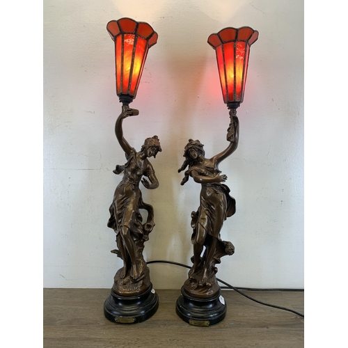 557 - A pair of 19th century style bronzed Charmeuse table lamps originally sculpted by Par L. More - appr... 