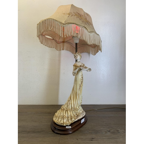 577 - A Capodimonte ceramic figural table lamp with hand painted floral shade - approx. 72cm high