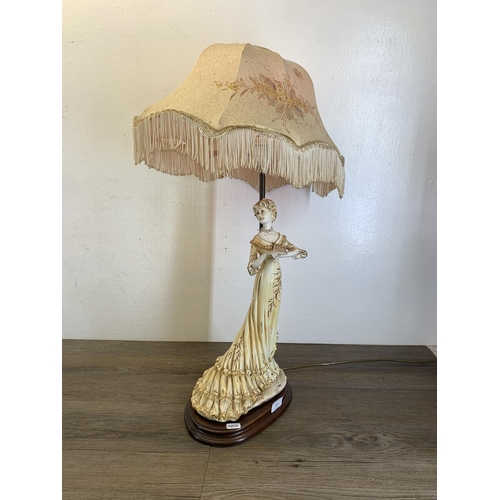 577 - A Capodimonte ceramic figural table lamp with hand painted floral shade - approx. 72cm high