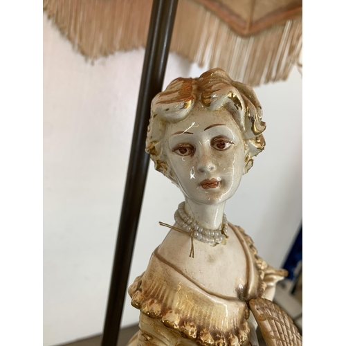 577 - A Capodimonte ceramic figural table lamp with hand painted floral shade - approx. 72cm high