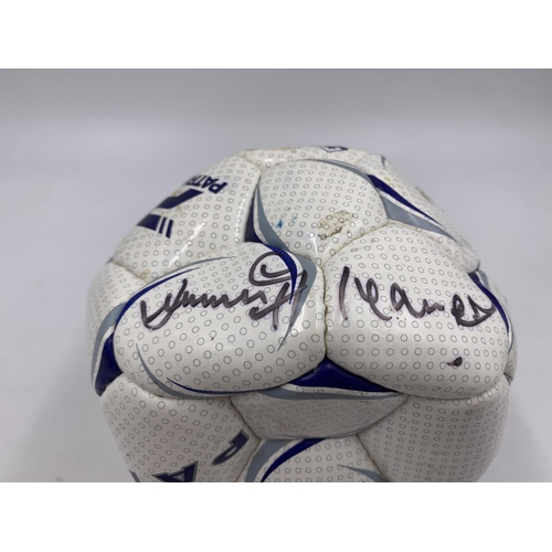 620 - Two items of signed football memrobilia, one framed England shirt signed 'M Owen' and one football s... 