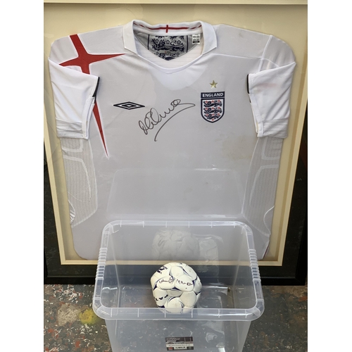 620 - Two items of signed football memrobilia, one framed England shirt signed 'M Owen' and one football s... 