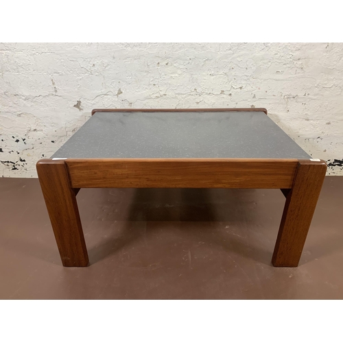 87 - A mid 20th century teak and black laminate coffee table