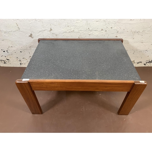 87 - A mid 20th century teak and black laminate coffee table