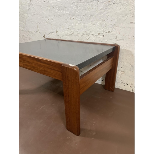 87 - A mid 20th century teak and black laminate coffee table