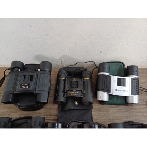 681 - A collection of cased pocket binoculars to include Bushnell 16x32, Nikula, Trikon Optical 8x21, Prak... 