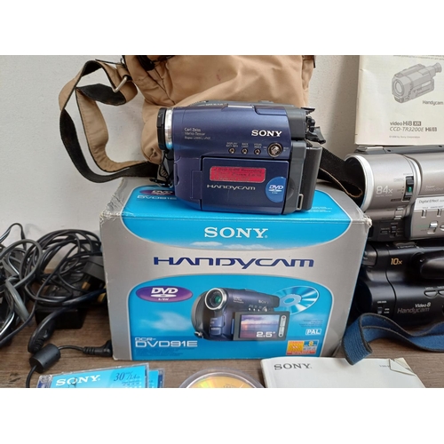 683 - Five Sony camcorders to include boxed DCR-DVD91E with charger, remote control and instruction manual... 