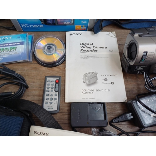 683 - Five Sony camcorders to include boxed DCR-DVD91E with charger, remote control and instruction manual... 