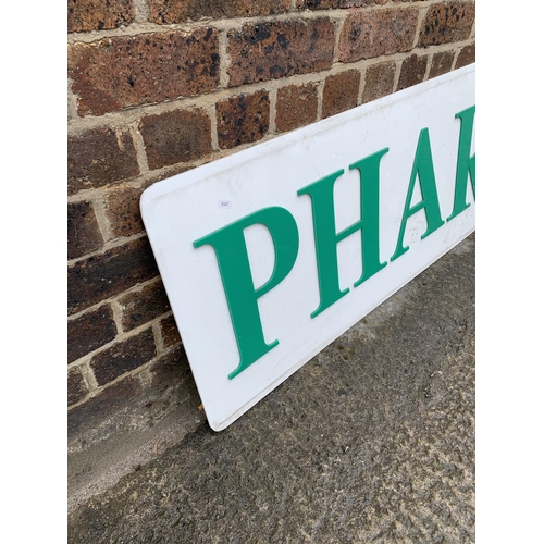 865 - A large acrylic Pharmacy sign - approx. 300cm wide x 52cm high