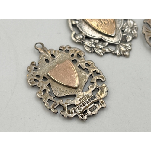 2066 - Three hallmarked Birmingham silver watch fobs/medallions - approx. gross weight 27.6g