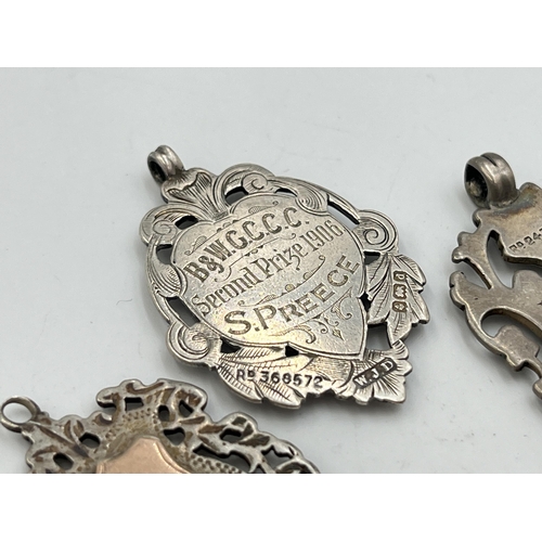 2066 - Three hallmarked Birmingham silver watch fobs/medallions - approx. gross weight 27.6g