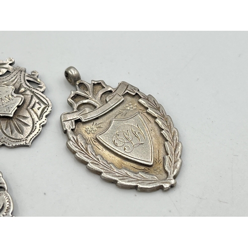 2068 - Three hallmarked Birmingham silver watch fobs/medallions - approx. gross weight 23.9g