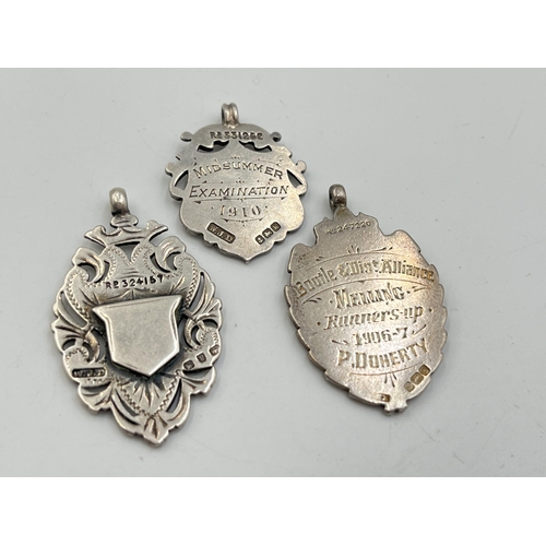 2068 - Three hallmarked Birmingham silver watch fobs/medallions - approx. gross weight 23.9g