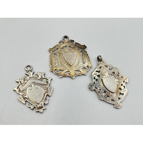 2069 - Three hallmarked Birmingham silver watch fobs/medallions - approx. gross weight 24.7g