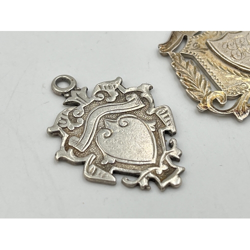 2069 - Three hallmarked Birmingham silver watch fobs/medallions - approx. gross weight 24.7g